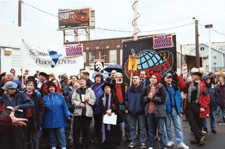 Seattle Peace Chorus carries banner in peace rally